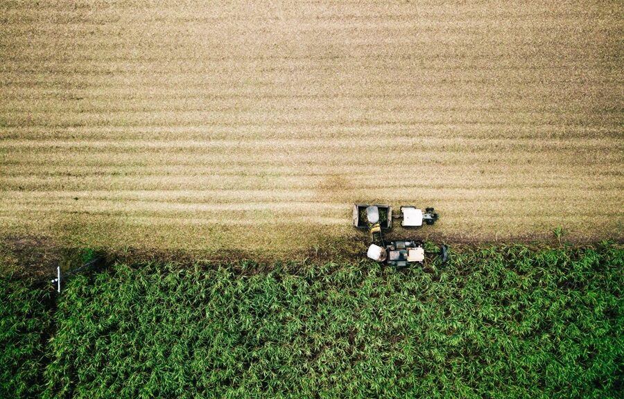 Birdseye view of a tractor harvesting crops